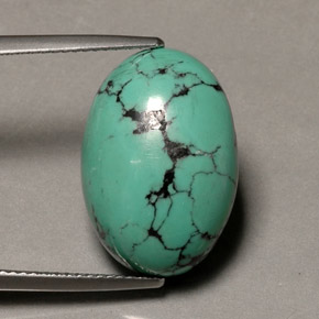13.65カラットの天然グリーンターコイズ（19.4×13.4 mm・オーバルカット）