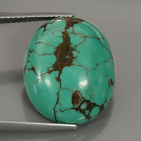 15.63カラットの天然ブルーグリーンターコイズ（18.5×15.3 mm・オーバルカット）