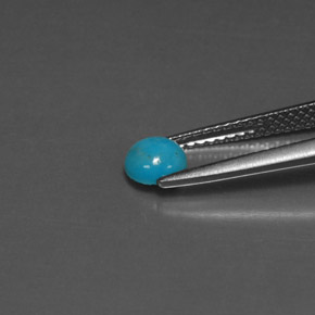 0.39カラットの天然ブルーターコイズ、ラウンドカット、オペーク