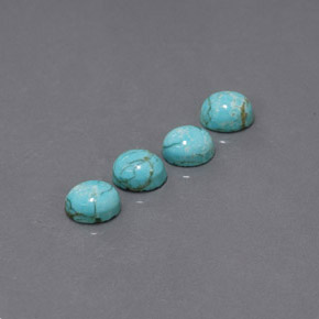 カラットの天然ブルーグリーンターコイズ（8×6.3 mm・オーバルカット）