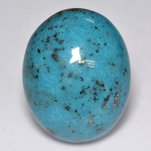 23.76カラットの天然ダークグリーンがかったブルーターコイズ（21.8×17.6 mm・オーバルカット）
