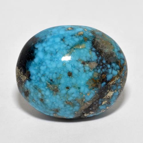 22.66カラットの天然ダークグリーンがかったブルーターコイズ（19.2×16.1 mm・オーバルカット）