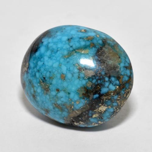 22.66カラットの天然ダークグリーンがかったブルーターコイズ（19.2×16.1 mm・オーバルカット）