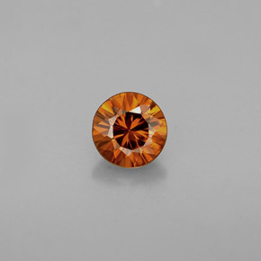 0.60カラットの天然オレンジジルコン（4.61 mm・ラウンドカット）