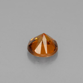0.60カラットの天然オレンジジルコン（4.64 mm・ラウンドカット）