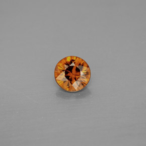 0.99カラットの天然オレンジジルコン（5.60 mm・ラウンドカット）