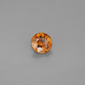 0.99カラットの天然オレンジジルコン（5.60 mm・ラウンドカット）