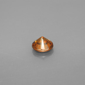 0.99カラットの天然オレンジジルコン（5.60 mm・ラウンドカット）