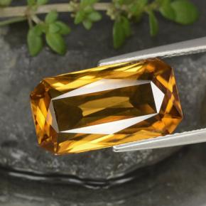 7.91カラットの天然ダークオレンジゴールドジルコン（14.7×8 mm・エメラルドカット）