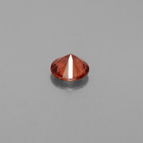 0.71カラットの天然ローズオレンジジルコン（5.12 mm・ラウンドカット）