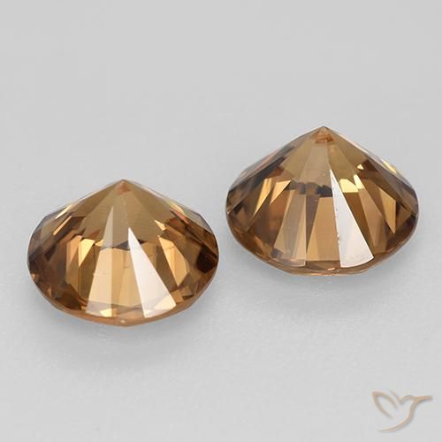 Shop natural 3.89ct ミディアムオレンジ ジルコン gems, ラウンド, from カンボジア at GemSelect. In stock, global shipping!