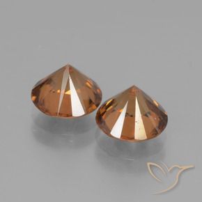 Shop natural 3.94ct 黄色がかったオレンジ ジルコン gems, ラウンド, from カンボジア at GemSelect. In stock, global shipping!