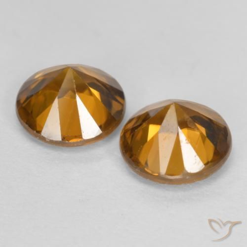 Shop natural 2.32ct ミディアムダークオレンジ ジルコン gems, ラウンド, from カンボジア at GemSelect. In stock, global shipping!