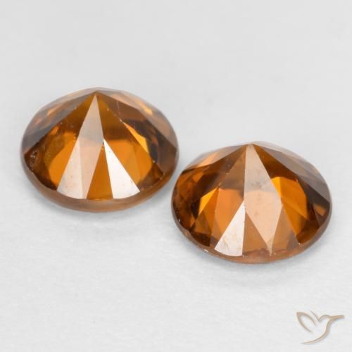 Shop natural 2.41ct ミディアムダークオレンジ ジルコン gems, ラウンド, from カンボジア at GemSelect. In stock, global shipping!