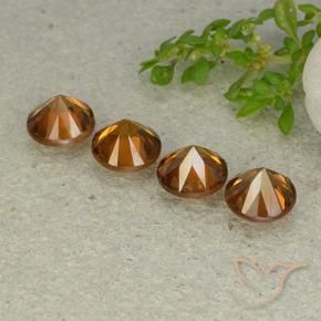 Shop natural 4.75ct ミディアムダークオレンジ ジルコン gems, ラウンド, from カンボジア at GemSelect. In stock, global shipping!