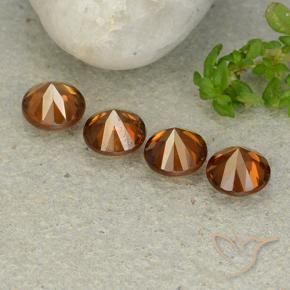 Shop natural 4.94ct アンバーオレンジ ジルコン gems, ラウンド, from カンボジア at GemSelect. In stock, global shipping!