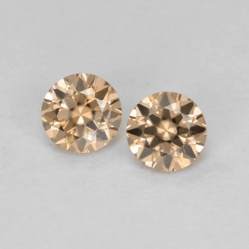 0.33カラットの天然Light Neutral Orangeジルコン（3.01 mm・ラウンドカット）