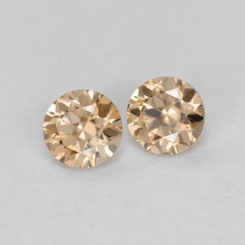 0.33カラットの天然Light Neutral Orangeジルコン（3.01 mm・ラウンドカット）