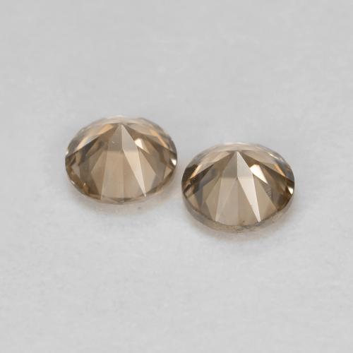 0.33カラットの天然Light Neutral Orangeジルコン（3.01 mm・ラウンドカット）