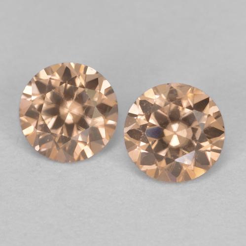 0.33カラットの天然Light Neutral Orangeジルコン（3.02 mm・ラウンドカット）