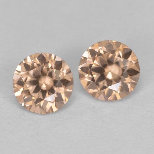 0.33カラットの天然Light Neutral Orangeジルコン（3.02 mm・ラウンドカット）