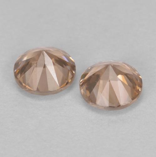 0.33カラットの天然Light Neutral Orangeジルコン（3.02 mm・ラウンドカット）