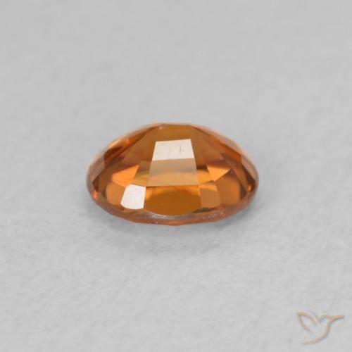0.60カラットの天然ディープオレンジジルコン、楕円形、VS