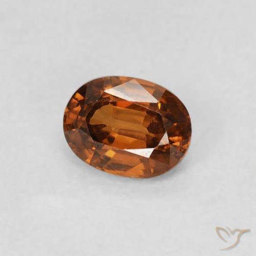 0.60カラットの天然Medium Dark-Orangeジルコン、楕円形、VS