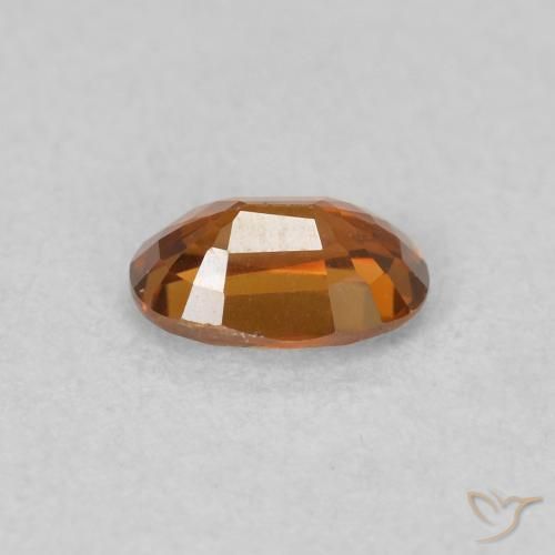 0.73カラットの天然Medium Dark-Orangeジルコン、楕円形、VVS