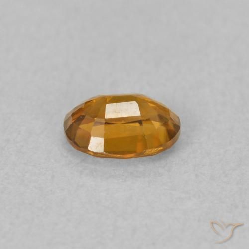 0.58カラットの天然茶色がかったオレンジジルコン、楕円形、VVS-VS