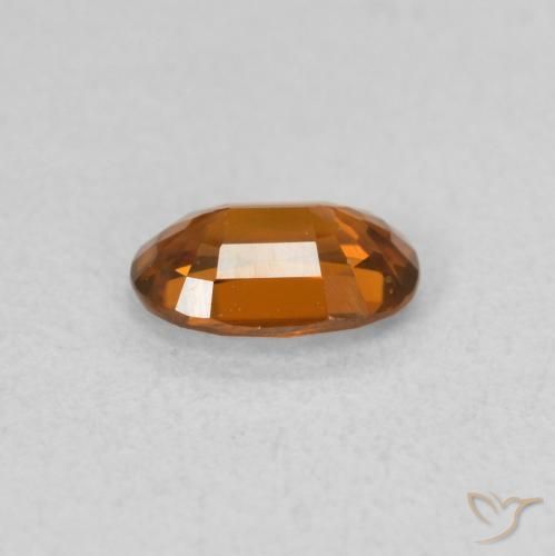 0.64カラットの天然赤みがかったオレンジジルコン、楕円形、VVS
