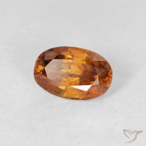 0.80カラットの天然Medium Dark-Orangeジルコン、楕円形、VS