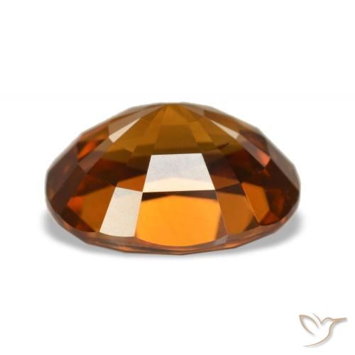 5.52カラットの天然Medium Dark-Orangeジルコン（10.5×8.8 mm・オーバルカット）